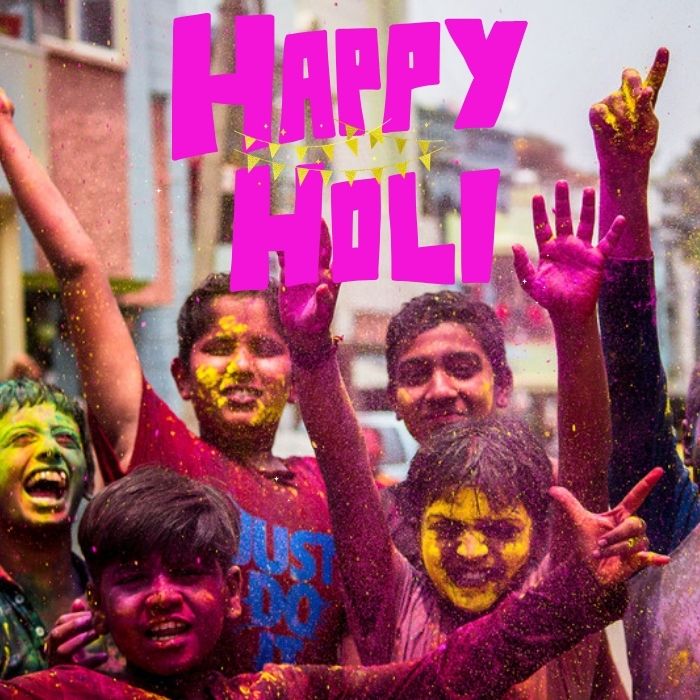 Colorful Holi celebration with people joyfully throwing vibrant powders in the air, symbolizing happiness and unity.Happy Holi images.
